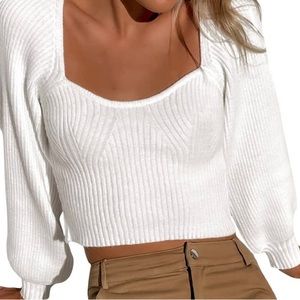 white knitted sweater.